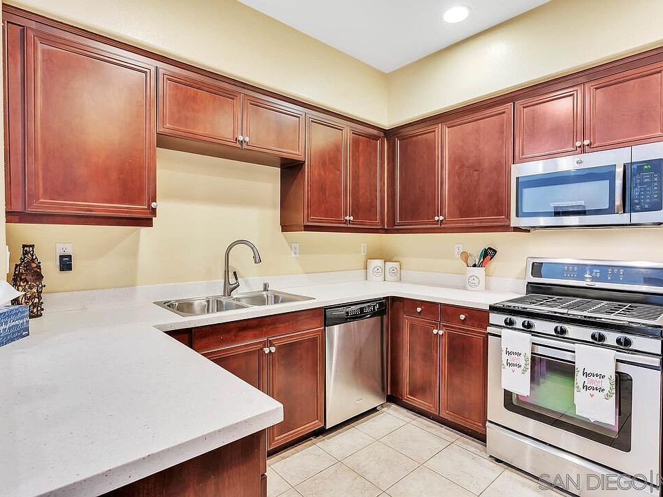 Open Kitchen with Stainless Steel Appliances