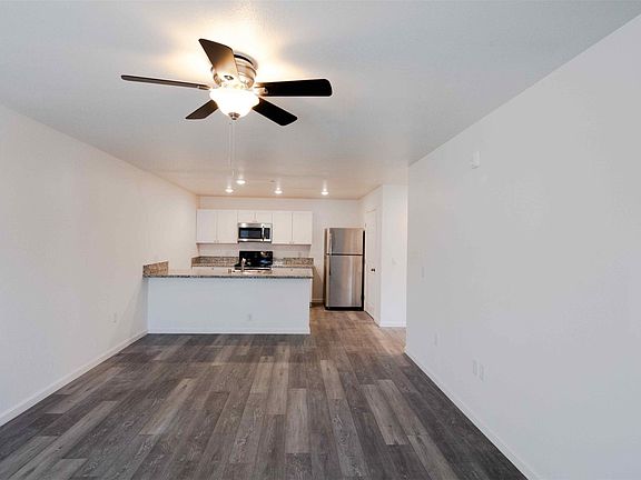 Living area and open floor plan to kitchen
