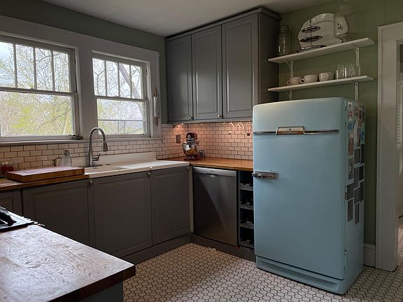 We are obsessed with our 1950's refrigerator (and the fact it's still working perfectly)! Not to fret if you are wondering about additional storage space...there's a full-size fridge and deep freeze in the basement along with a drink cooler in the butler'
