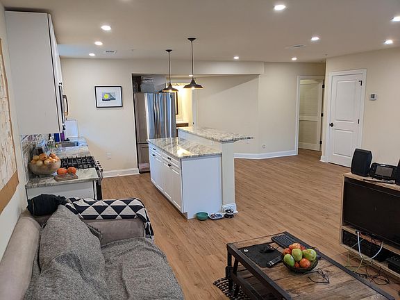 Living Room to Kitchen, 1/2 Bath, & Laundry Room