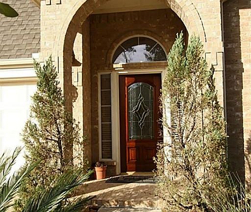 Come take a tour of this home which starts with a leaded glass door.
