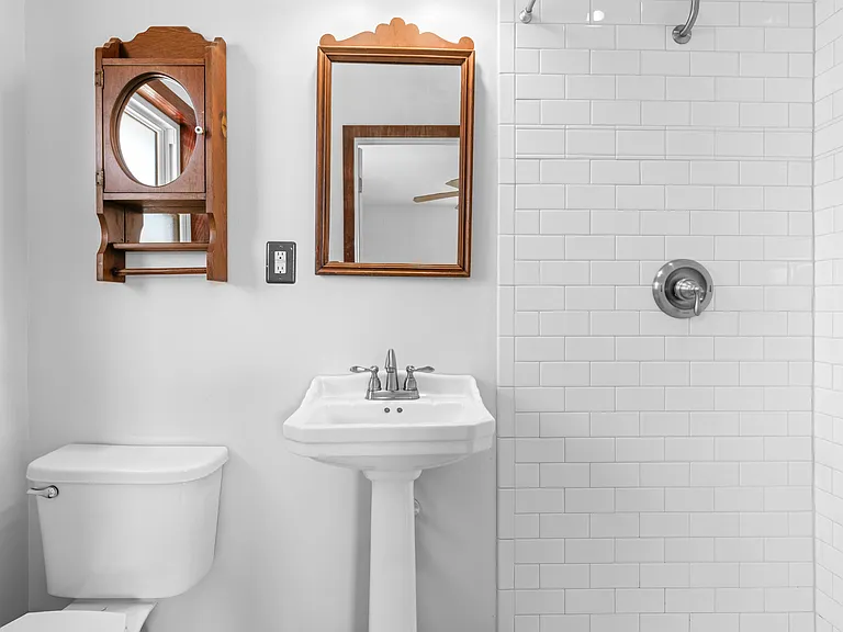 A charming mix of original character and modern updates, including crisp subway tile in the primary ensuite.