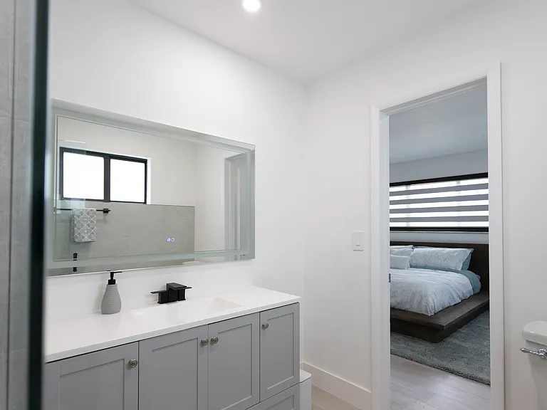 Mastrer Bathroom with master bed in background
