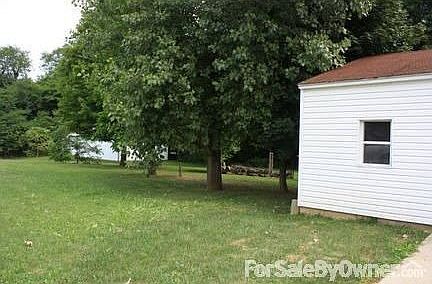 A second view of the backyard near the garage.