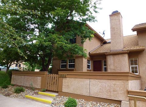 Front with enclosed patio