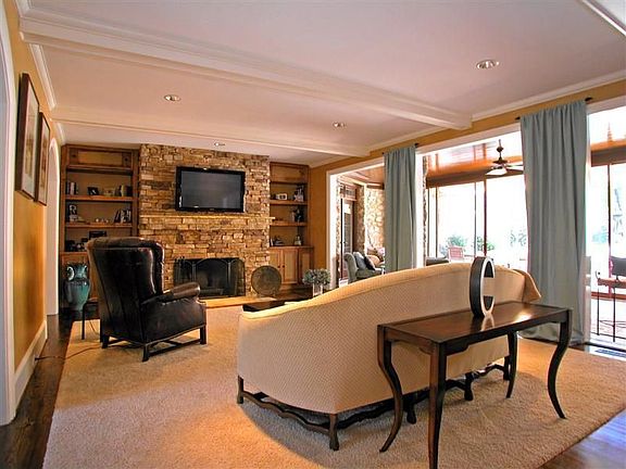  3 - 10-foot openings from family room to sunroom and backyard oasis 