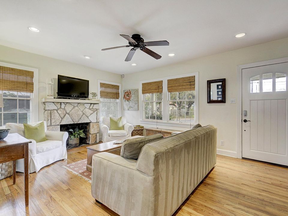 front entry & living room. non-working, but beautiful fire place.