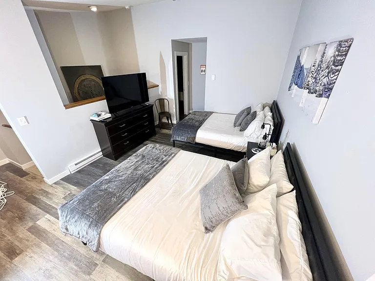 Bedroom 2: 2 Queen Beds, 55 in LED TV, Arcade (2nd floor)