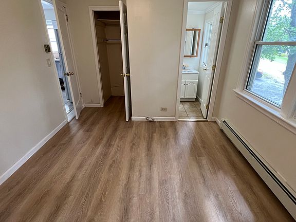 Bedroom with half bathroom