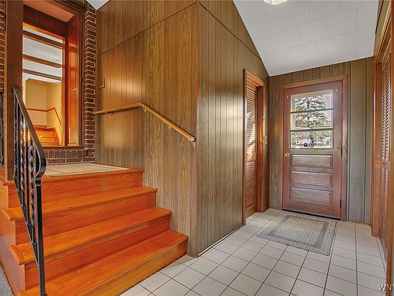 Breezeway has tile flooring, nice size coat closet
