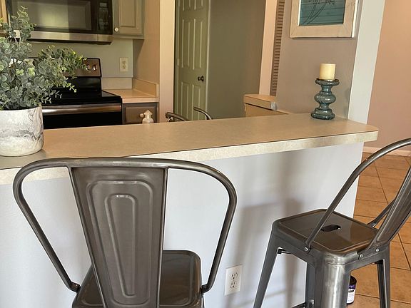 Breakfast Bar looking towards the kitchen and entry