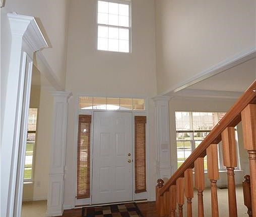 Soaring Two Story Entry Hall welcomes you!