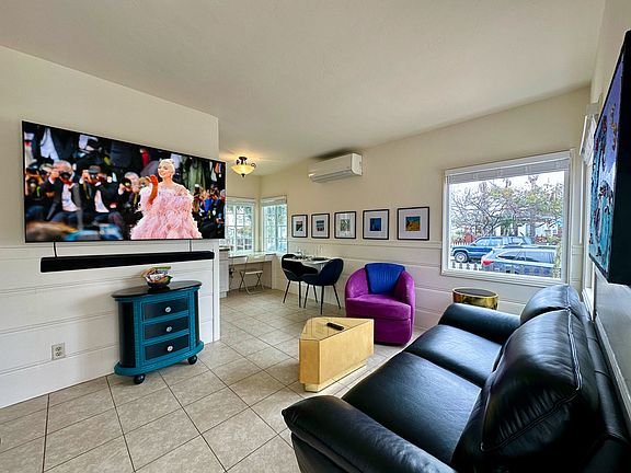 Leather Couch, 65" Sony Smart TV, Sony Surround Soundbar