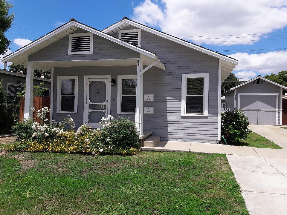 Front House with 1 car garage plus 2 off street parking spaces. The large back yard is shared, 1/2 to front house and back 1/2 to back house. 2 fruit trees. Double drapery rods will be installed in Living Room, Dining Room and Bedroom. No window dressin