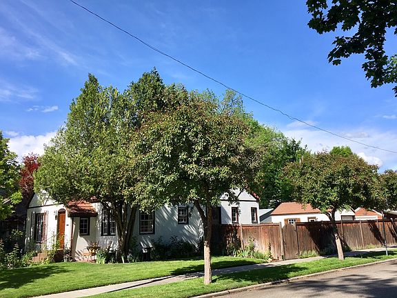 Corner view of home & garage