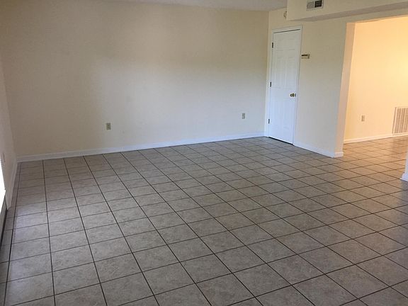 Living Room with access to outdoor patio