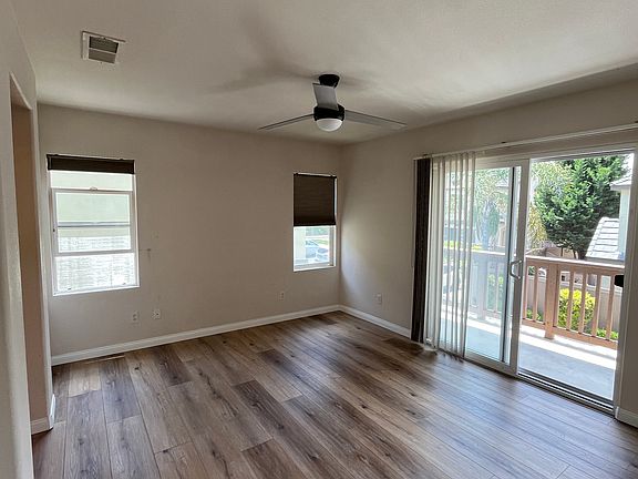 Large Main Bedroom with sliding double doors to the patio.