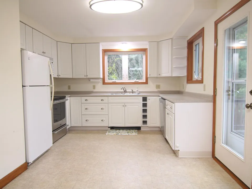 Kitchen with door to Mahogany Deck