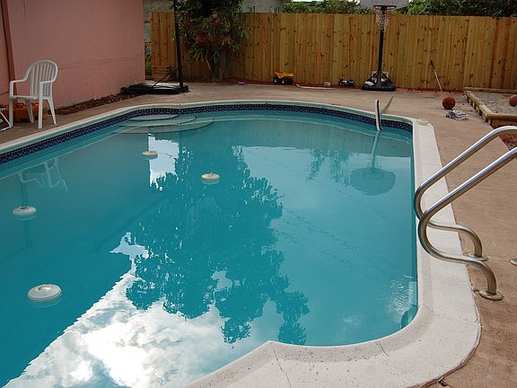 Pool Area w/ New Wood Fence