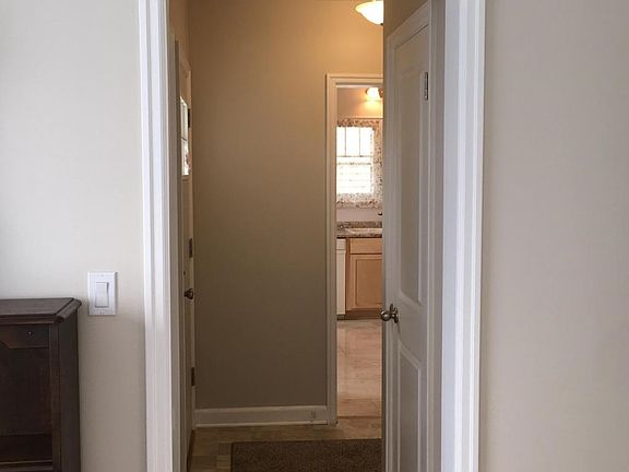 Office leads to half bath/kitchen