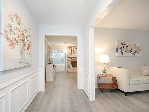 COME ON IN!!! Upon entering you are greeted with beautifully updated laminate floors through the main areas and that GORGEOUS light and bright feel everyone is looking for!