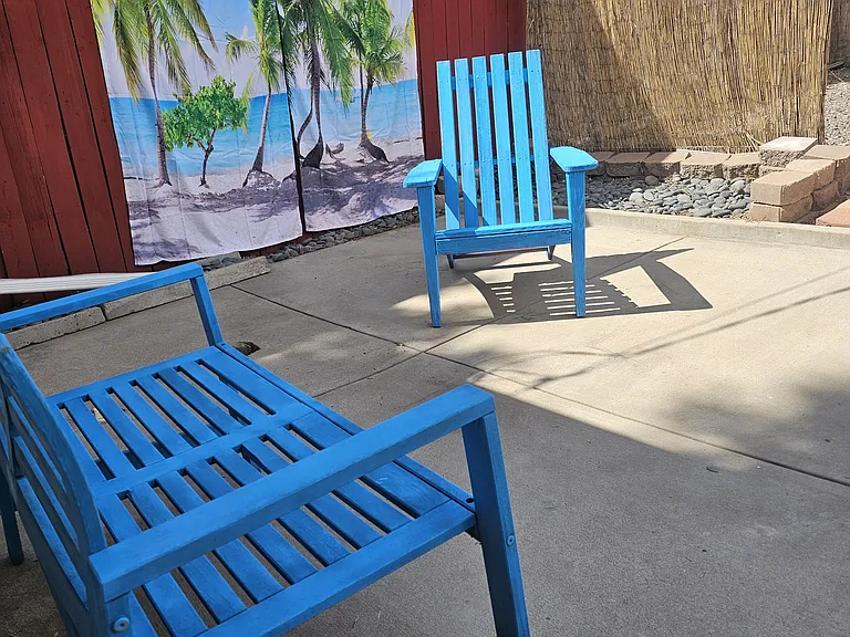 Back yard patio with six foot fence area
