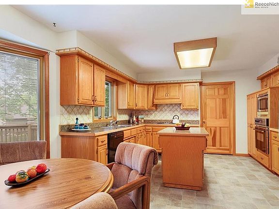 KITCHEN ISLAND IS MOBILE.  LAUNDRY ROOM THRU KITCHEN WITH POWDER ROOM.