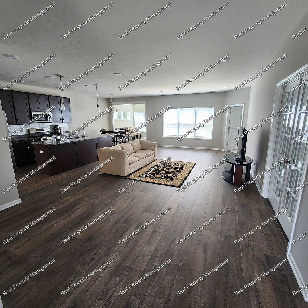 Maintenance Free 2 Bedroom Home — Photo 2