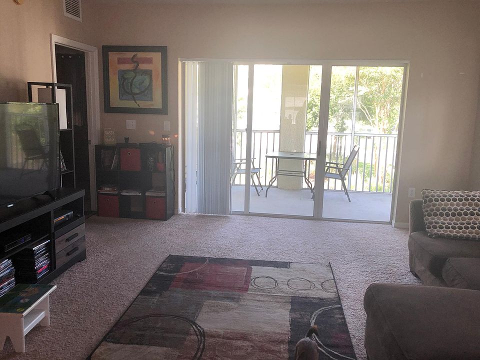 Living room looking out to the private screen balcony