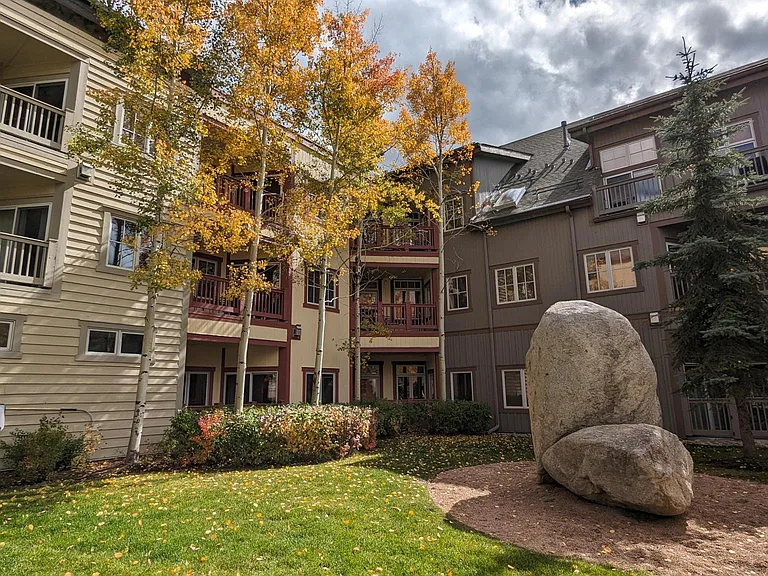 Climbing rock and lovely grass lawn right in your "backyard." Your patio is right behind the middle aspen.