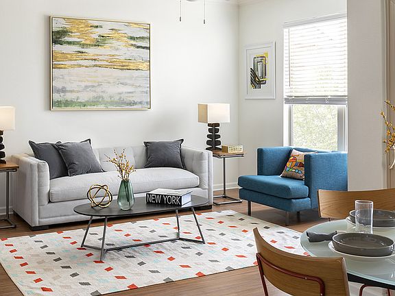 Apartment Living Room and Dining area with wood floors.