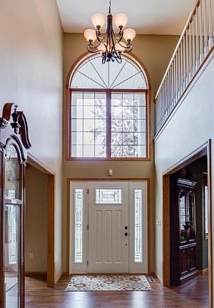 The Large Foyer w/Vaulted Ceiling and Open Living Area is very Inviting and Great for Entertaining!