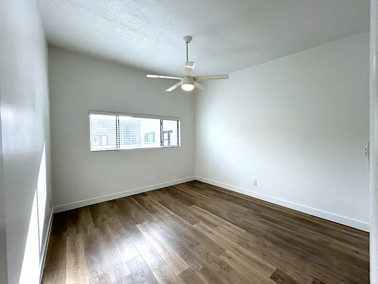 1 bedroom with plank flooring