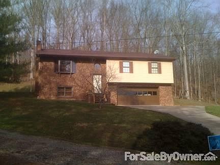 Front View
						:
						Home sits on a wooded lot approximately 1.5 acres and has large yard.