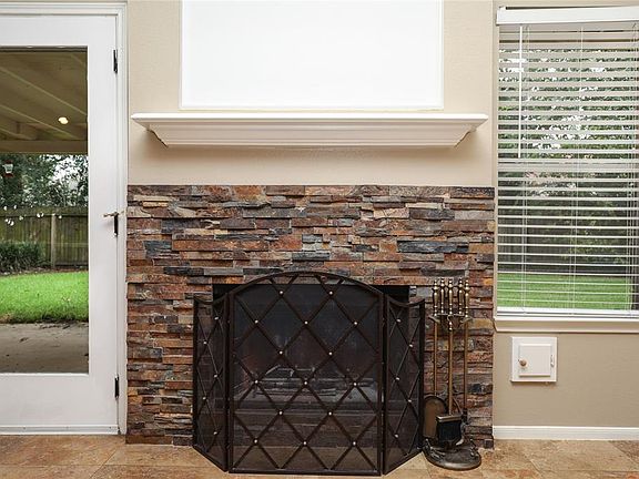 Nicely redone fireplace.