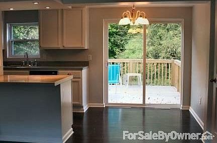 View of first floor from stairs
						:
						Great room from stairs.