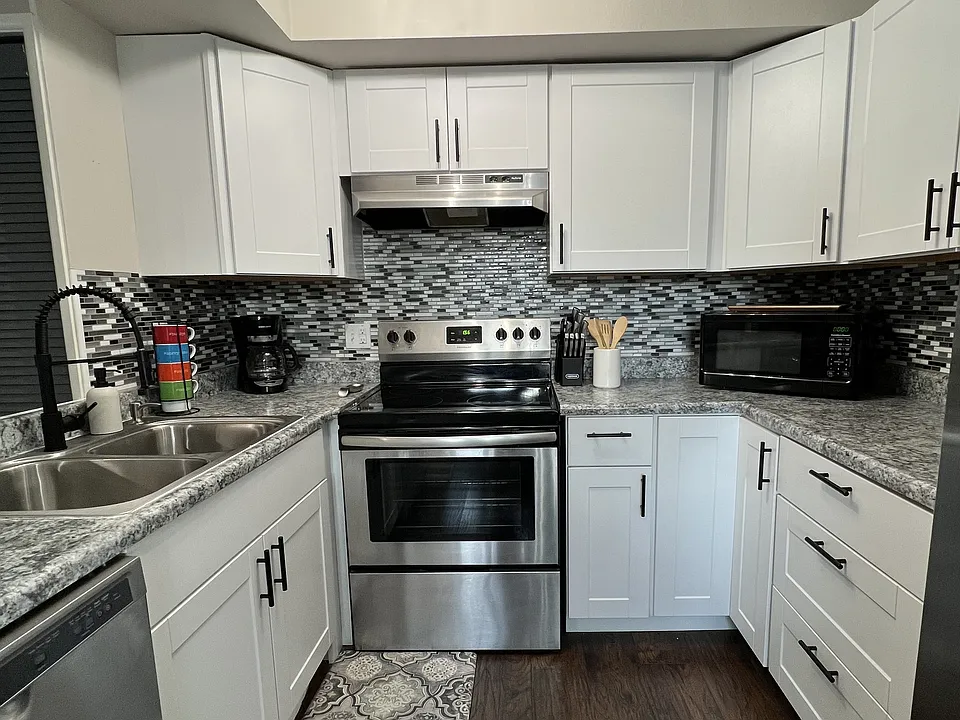 updated kitchen with full size stainless steel appliances