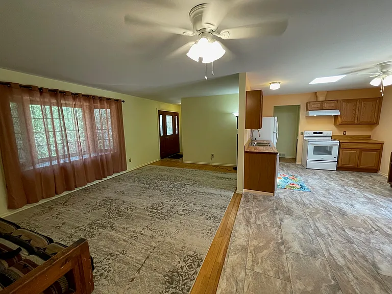 Open living/dining and kitchen area with good light.