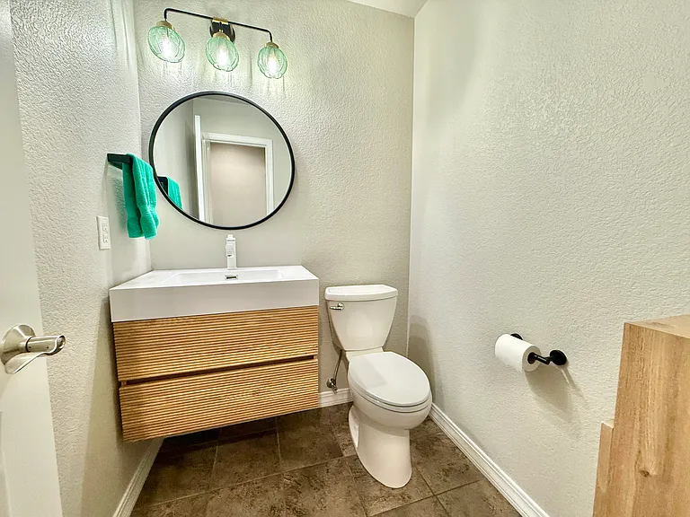 Newly updated main level half bath.
