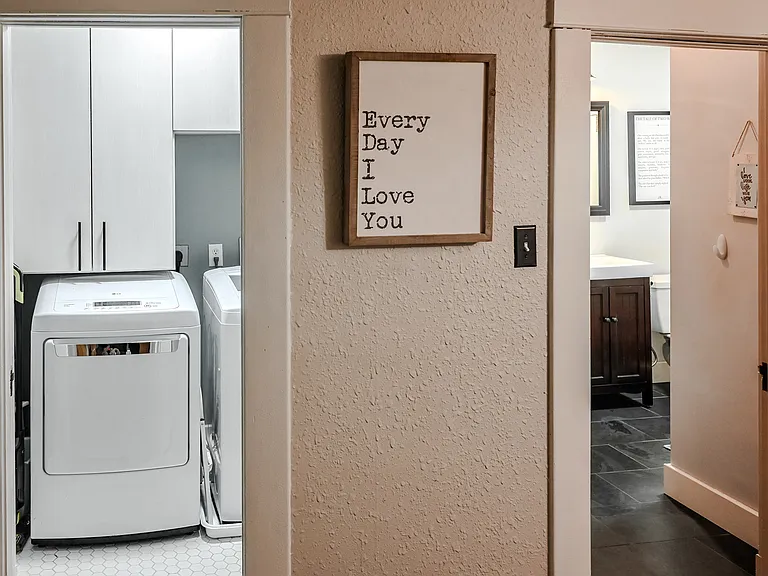 Laundry room and full bath with bath/shower.
