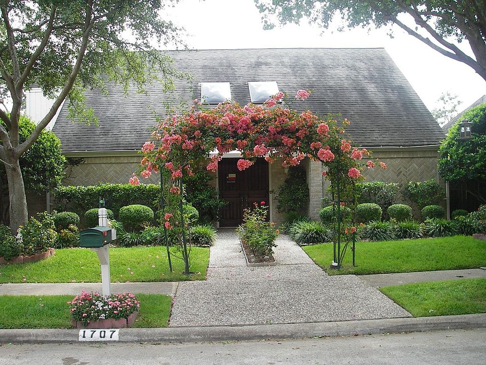 Old roof, but beautiful yard
