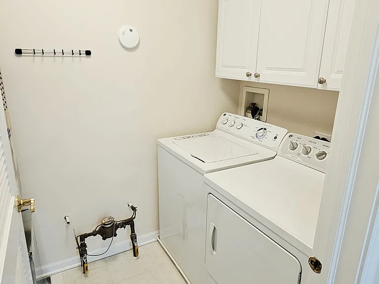 Utility room with Washer/Dryer and new HVAC.