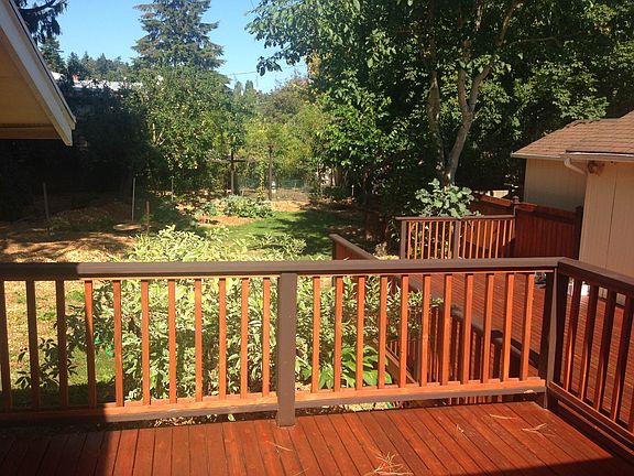 Large deck, fully fenced backyard