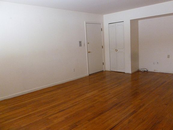Living room: entry door, closet & alcove