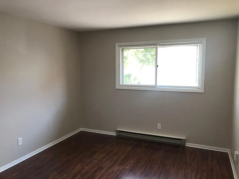 Big, bright, warm bedrooms with lovely new floors and plenty of streaming natural light!