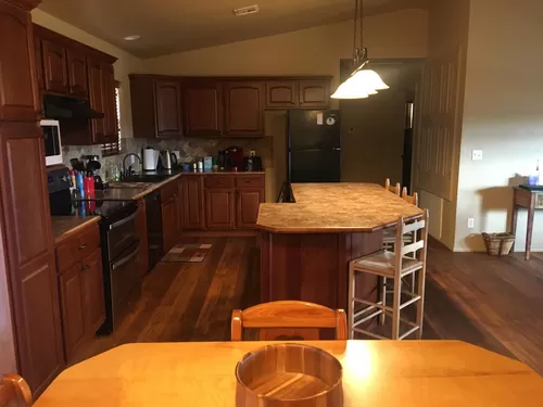 Fully furnished kitchen with appliances. - 18863 County Road 1020