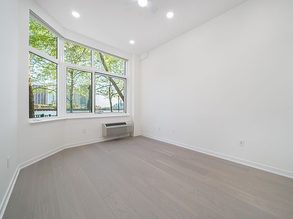 Bedroom with high ceilings