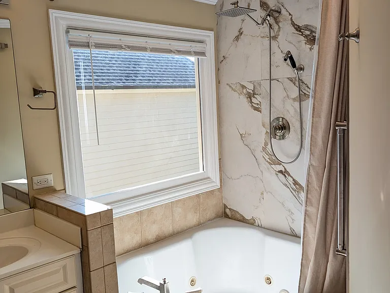 Outdoor shower feel with lots of sunshine. Or complete privacy with blinds drawn.