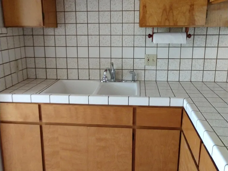 Kitchen sink and cupboards