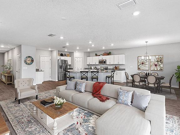 Enjoy a spacious and open living area - Wesley home plan by Highland Homes